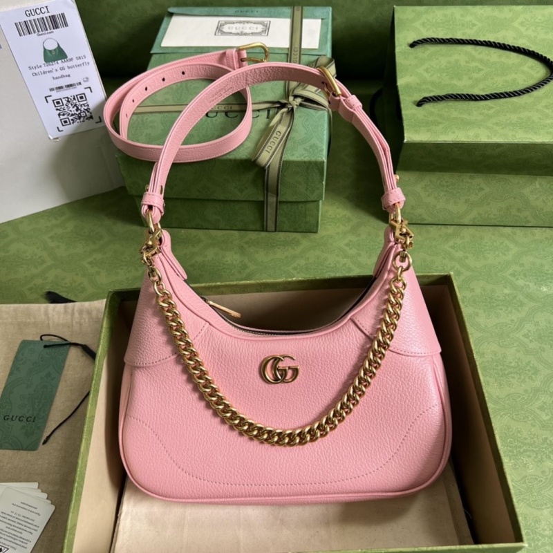 G*u*i top handle bags